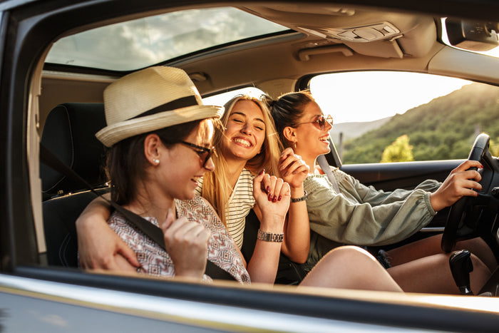 Friends travelling together on a road trip abroad after completing a 120-Hour TEFL course with premier TEFL and starting their international adventure.