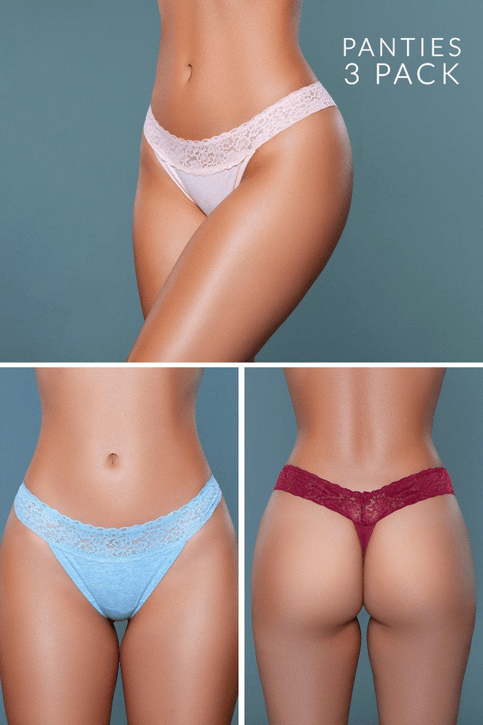 Three pairs of panties in white, blue, and red on a gray background.