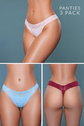 Three pairs of panties in white, blue, and red on a gray background.