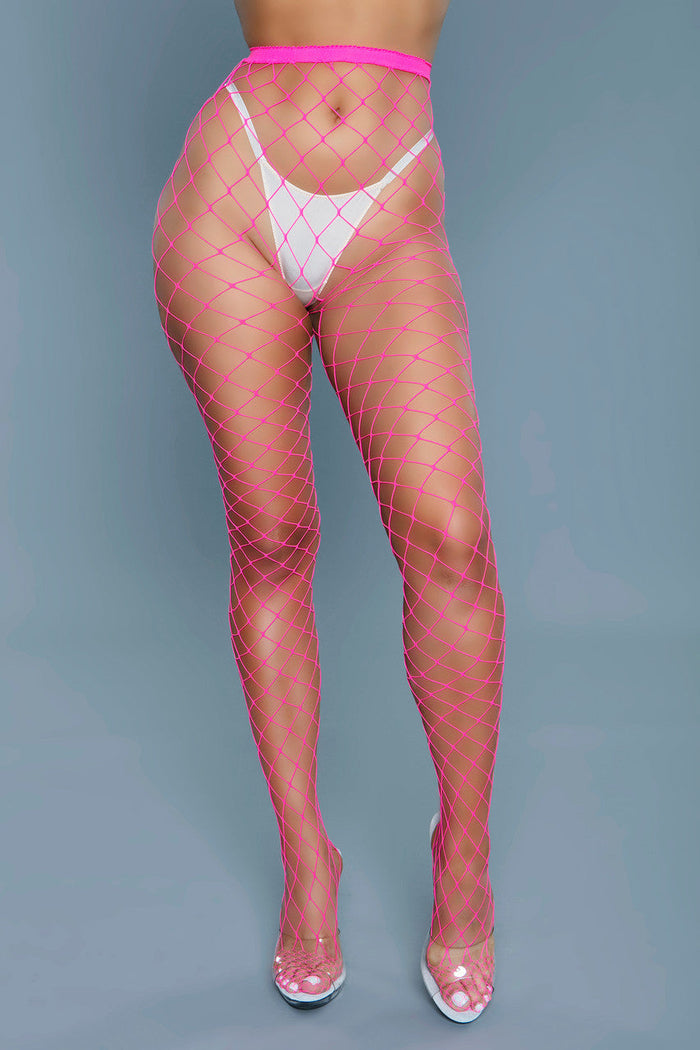 Fishnet stockings with pink mesh pattern on a gray background