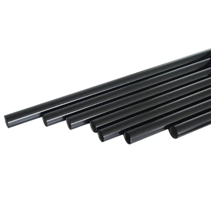 Set of black metal tubes for wind chimes on a white background