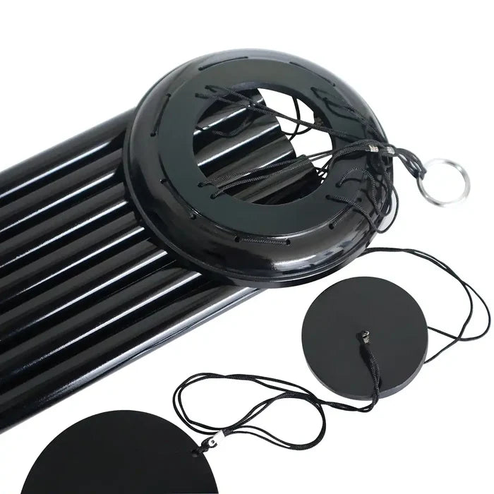 Black Corinthian bell wind chime with circular components on a white background