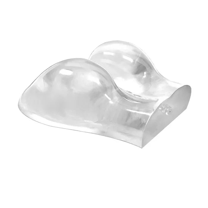 Clear silicone cupping device on a white background