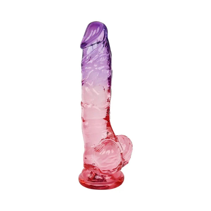Pink and purple glass pipe on a white background