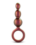 Multicolored, three-tiered ring-like object on a white background