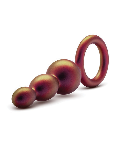 Three-tiered purple object on a white background