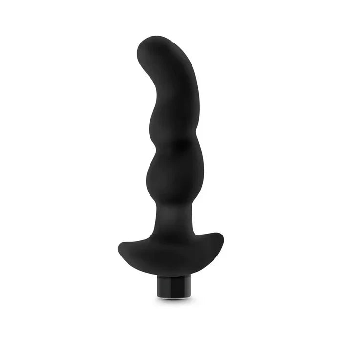 Black silicone butt plug on a white background