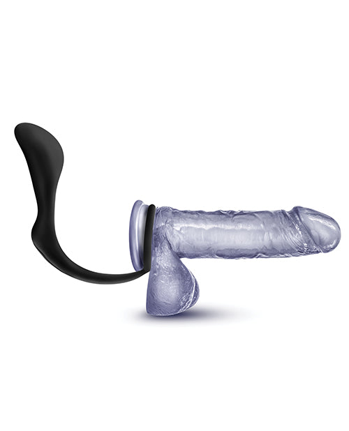 Sexual product with black and clear components on a white background
