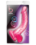 Pink toy in packaging with 'b yours' branding on a white background