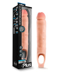 Realistic silicone penile enlargement product with packaging on a white background