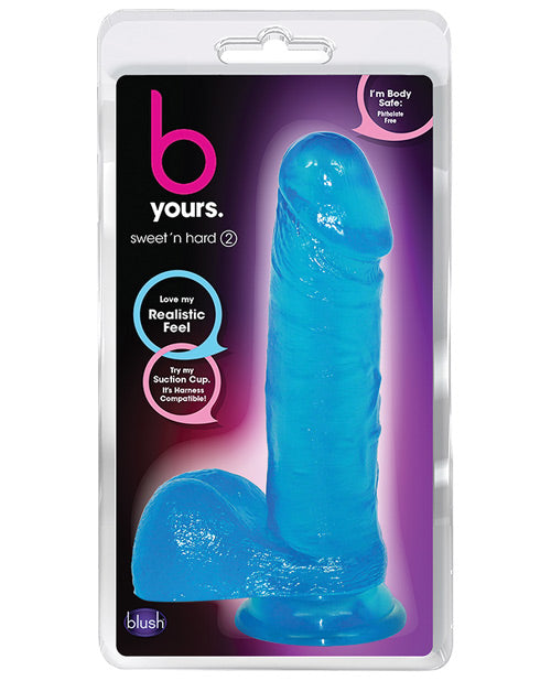 Blue toy in packaging with 'b yours' branding on a white background
