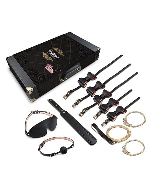Collection of leather and metal accessories with a black box on a white background