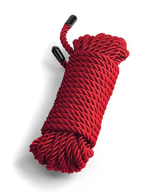 Red rope with black clips on a white background