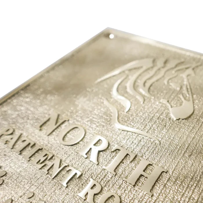 Close-up view Custom Brass Address Plaques: Engraved with Business Logos