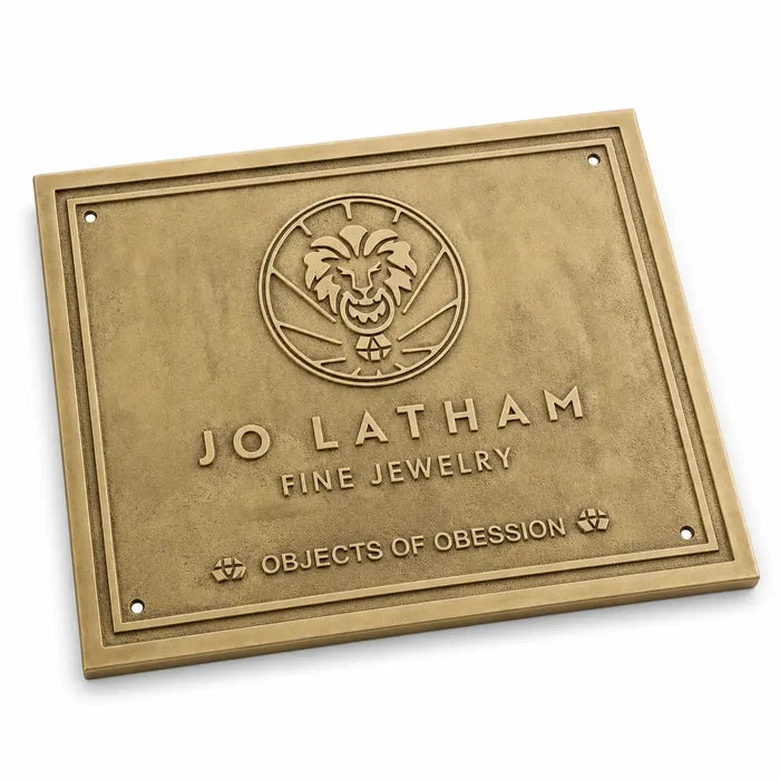 Custom brass address plaque with engraved name, street address, and house number