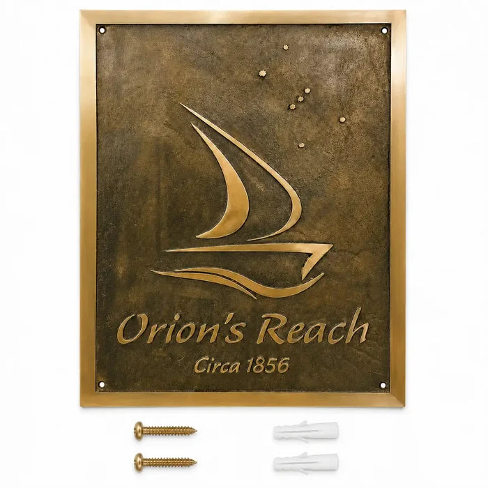 Custom brass address plaque displayed with two mounting screws and two wall anchors included for secure and easy installation.