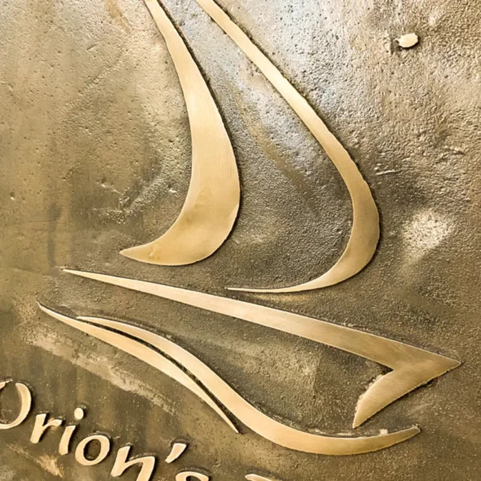 Close-up view of brass address plaque custom engraving and finish