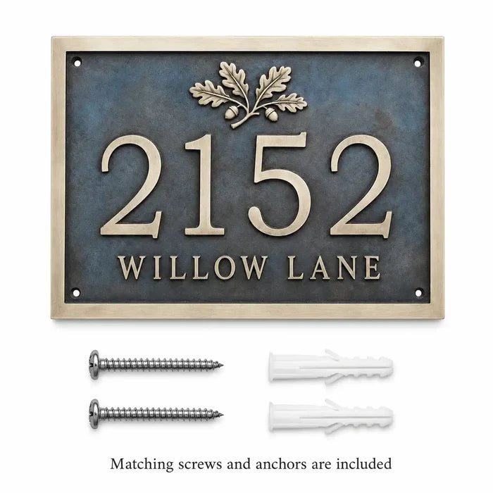 Brass House Number Plaque displayed with mounting screws and wall anchors for installation.