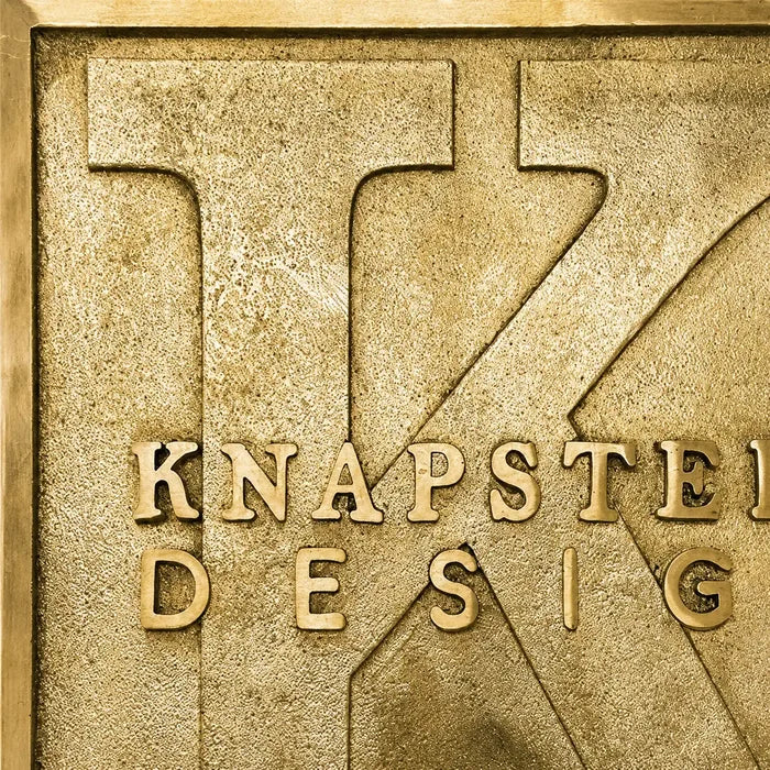 Custom brass address plaque with black and silver engraving