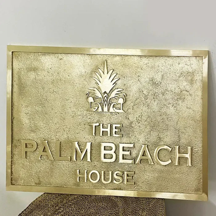 solid brass engraved address plate with logo on a white background | Handcrafted brass sign with name and logo