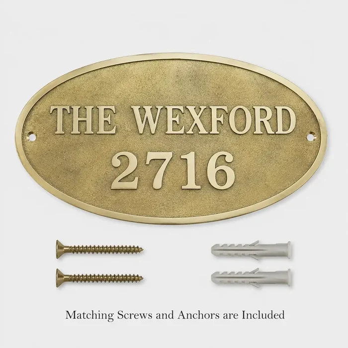 Outdoor Bronze Address Plaque shown with included screws and anchors for brick, stone or concrete walls.