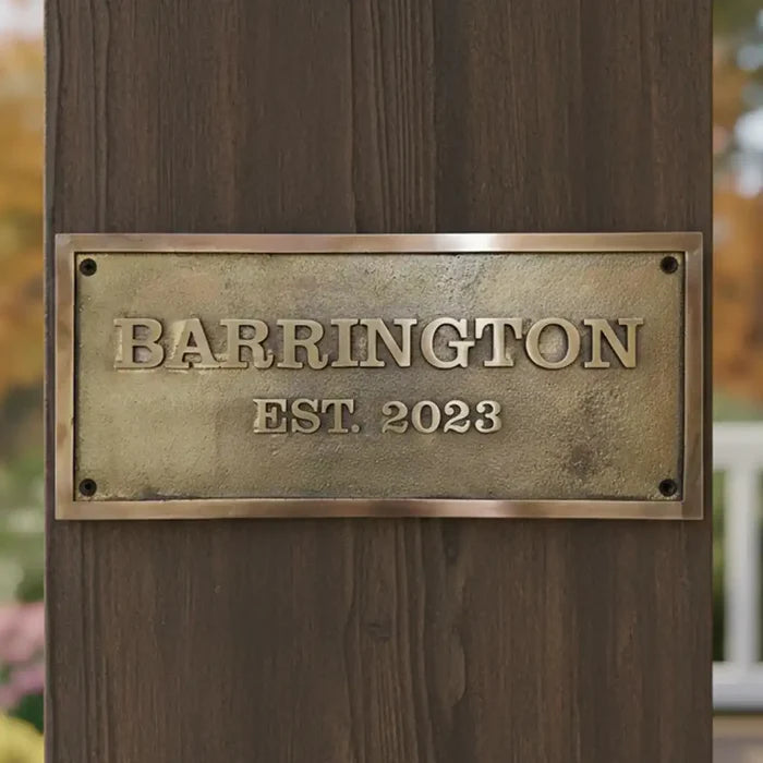Bronze plaque on a wooden post,
Bronze name plates