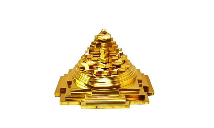 Gold Shree Yantra on a white background