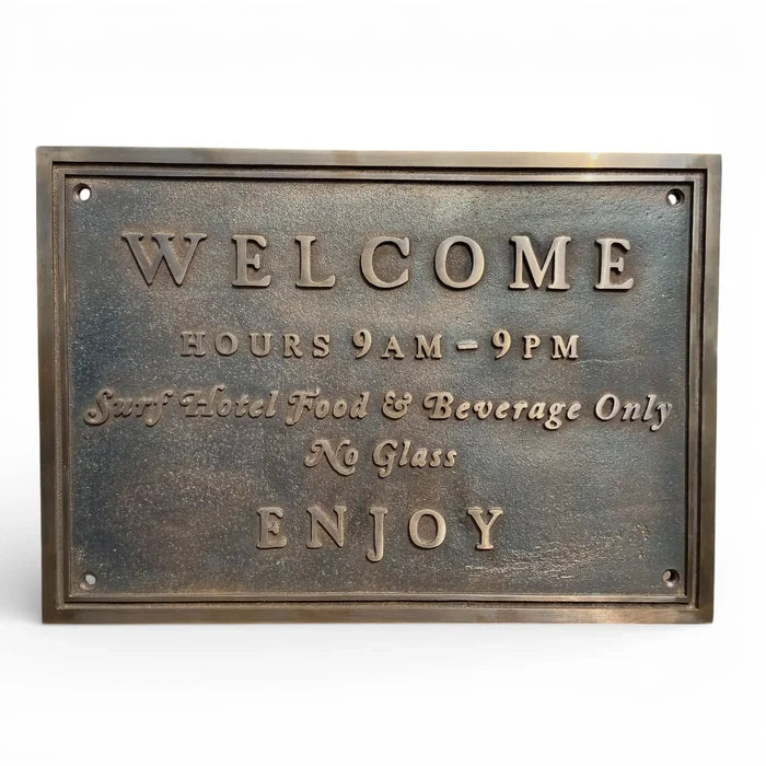 Bronze address plaque - Bronze welcome sign with text on a white background