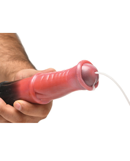 Hand holding a pink and black device with a white cord on a white background