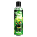 Bottle of Creature Slime with a green monster design on a white background
