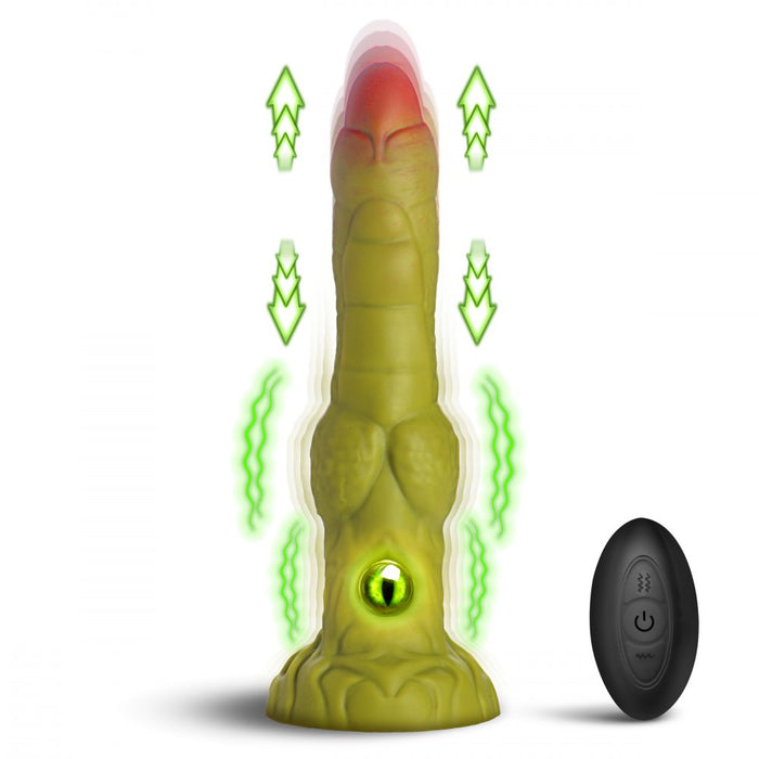 Toy resembling a green finger with red tip and black remote control on a white background
