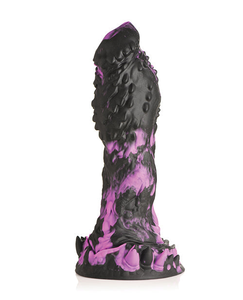 Black and purple textured object on a white background