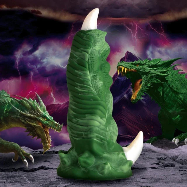 Green dragon toy figure with a detailed texture against a fantasy landscape background