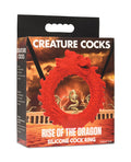 Silicone cock ring packaging with dragon design on a white background