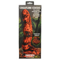 Package of a silicone dildo with tiger paw design, featuring text and a forest background.