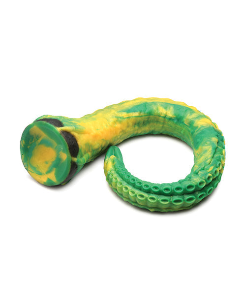 Green and yellow dog toy on a white background