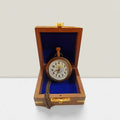 Engraved brass pocket watch with chain and wooden box