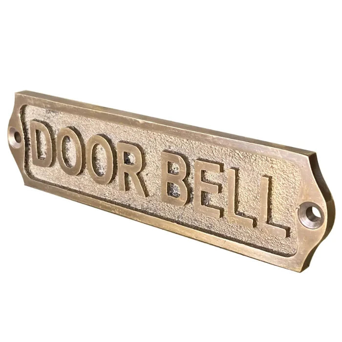 brass doorbell plaque with an elegant antique finish.