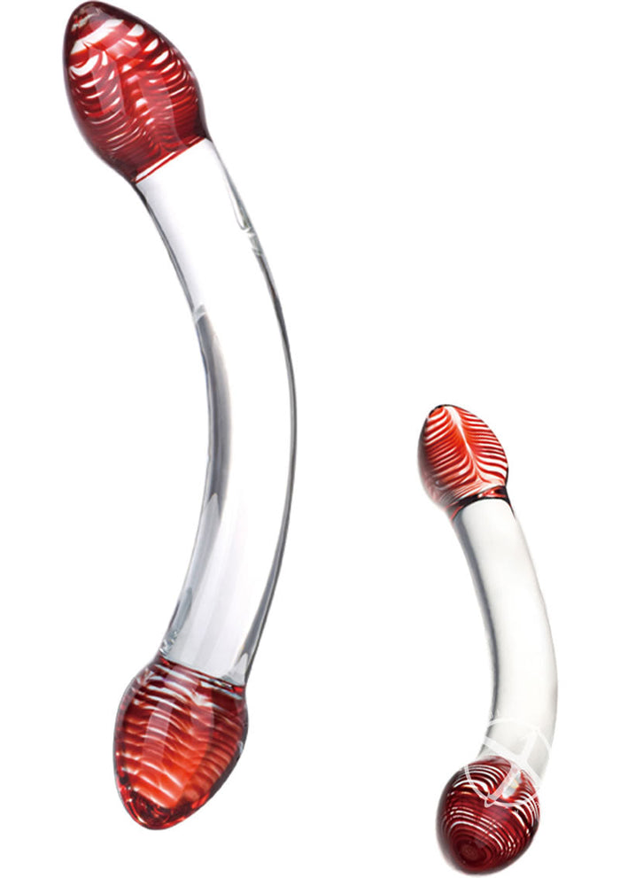 Two glass objects with red and white striped ends on a white background