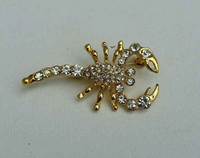 Gold plated scorpion brooch star sign cake pin - birth sign talisman protection