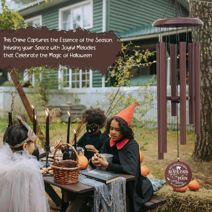 Halloween porch decorations featuring engraved wind chime