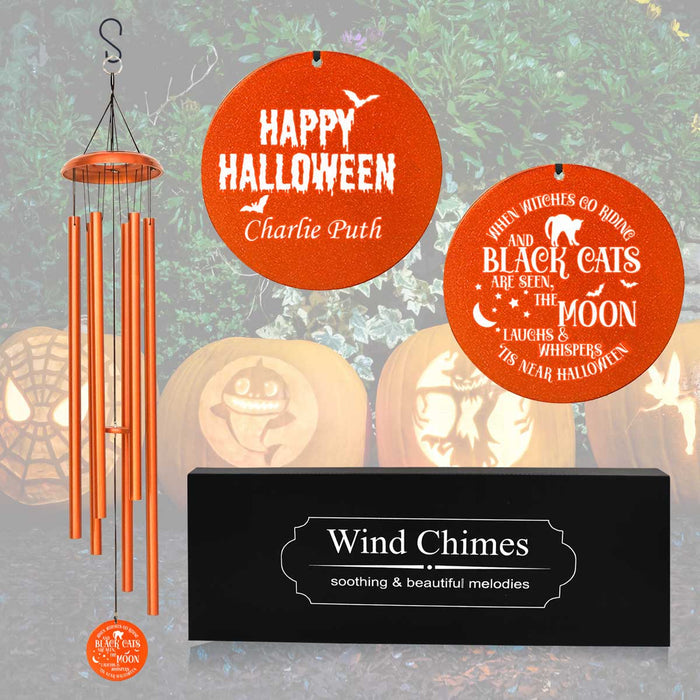 Orange-colored Halloween wind chime with personalized engraving for outdoor décor