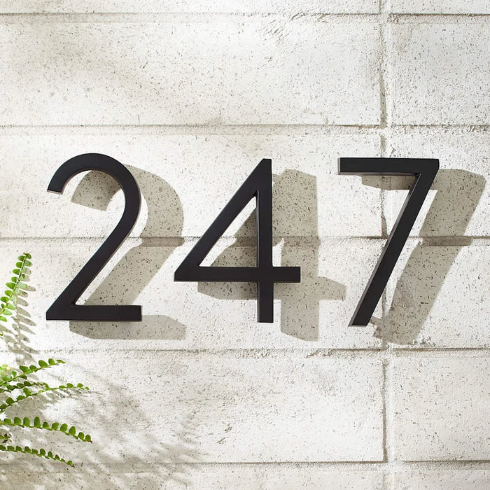 Brass house number sign