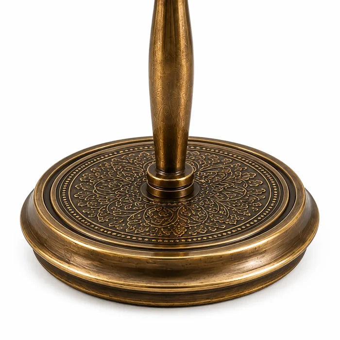 Close-up of engraved brass base.
