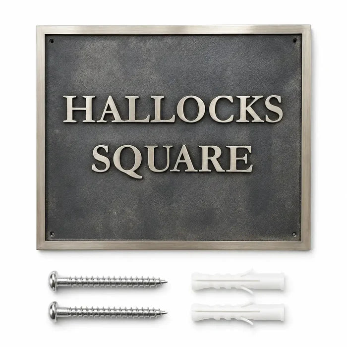 Personalized metal house plaque displayed with included screws and wall anchors on a clean white background.