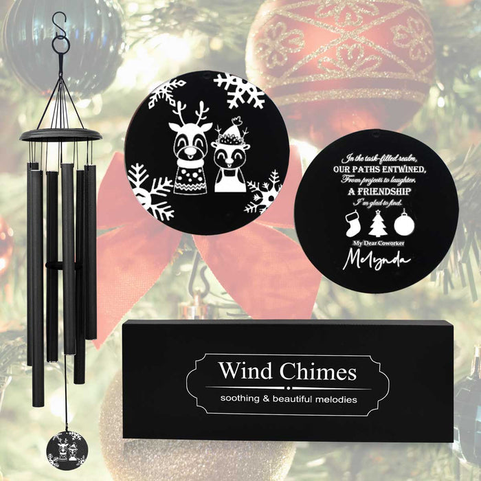 Personalized wind chime with a Christmas theme, featuring a black finish and custom engraved pendants.