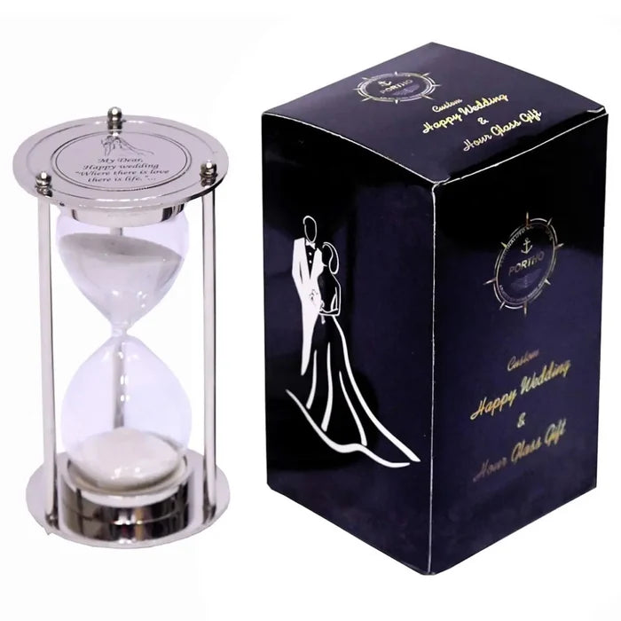 Engraved sand timer with names and date, perfect for wedding anniversaries and for couples' gifts.
