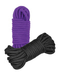 Purple and black ropes on a white background