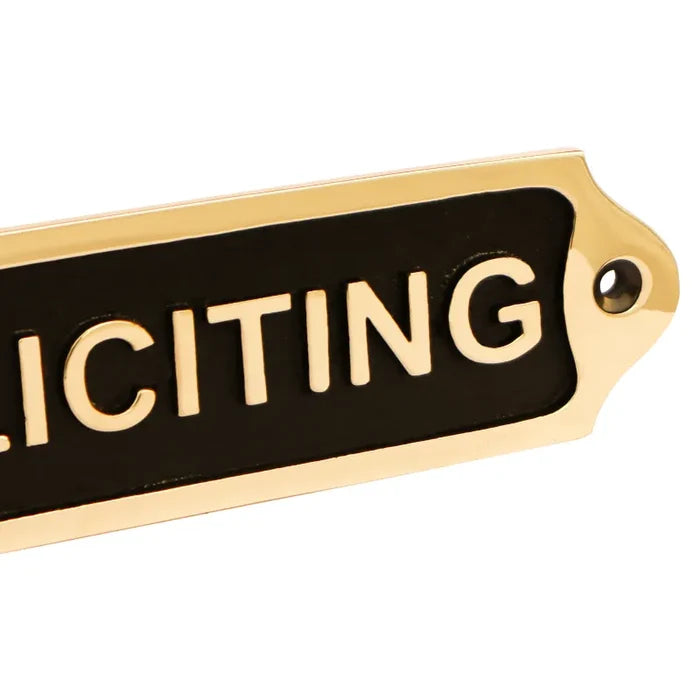 Prevent unwanted visitors with this classic "No Soliciting" door plaque crafted from black finish brass. Durable and stylish. Buy now!