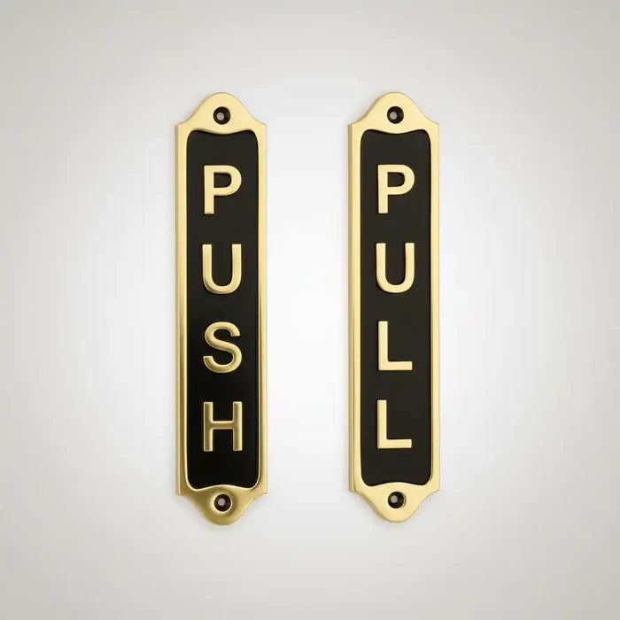 Two door signs labeled 'Push' and 'Pull' on a light gray background